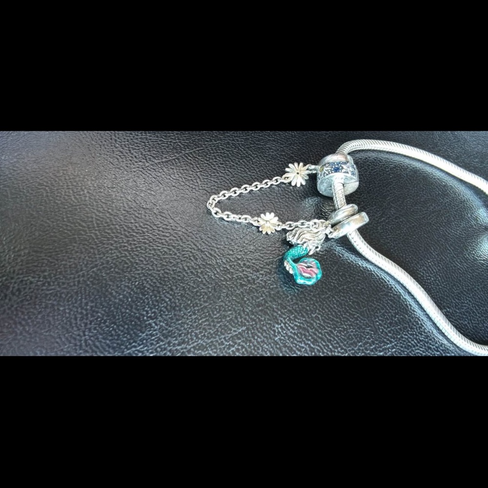 Elegant Silver Charm Bracelet with Green Accents
